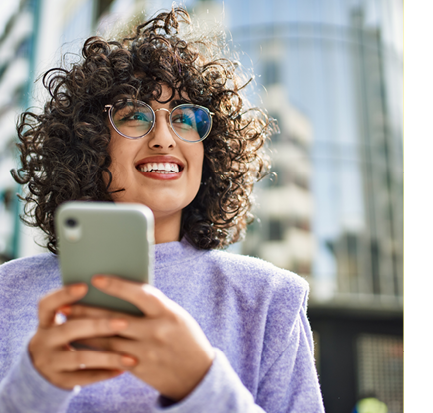 Young middle east woman smiling confident using smartphone at street