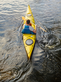 man kayaking