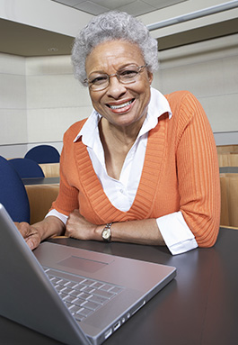 retired woman at laptop