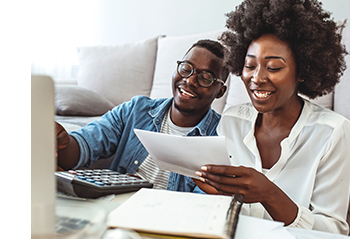 couple looking at financial documents