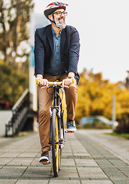 Man riding a bike to work